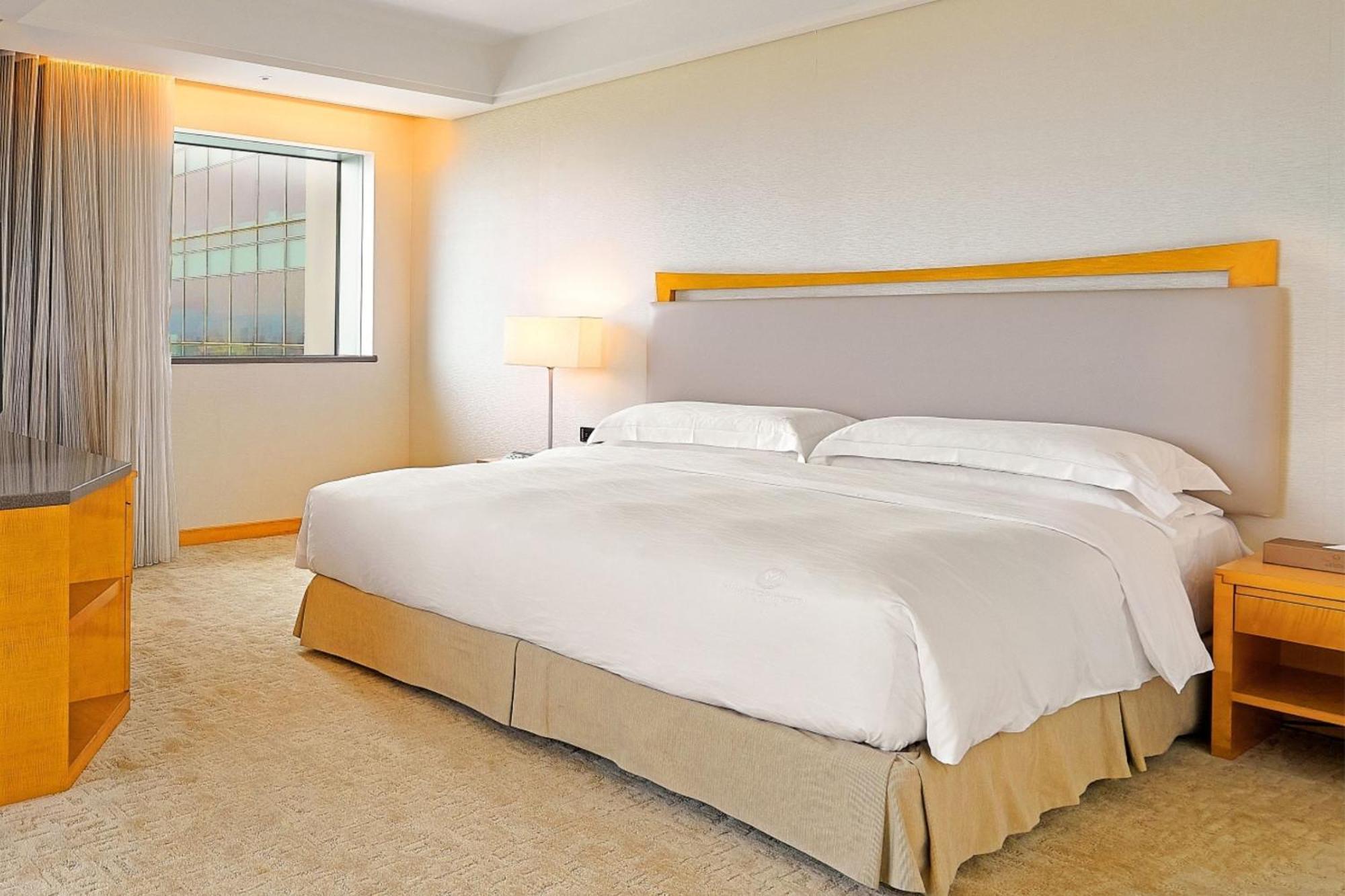 วินเซอ โฮเต็ล Hotel ไถจง ห้อง รูปภาพ A bedroom at the hotel